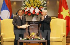 Lao top leader concludes official friendly visit to Vietnam