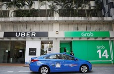 Singapore investigates Grab-Uber merger 