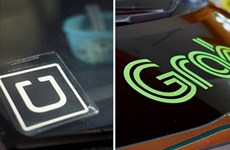 Ministry opens investigation into Grab’s acquisition of Uber in Vietnam