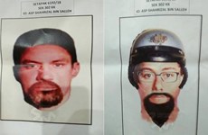 Malaysia releases images of suspects in Palestinian killing