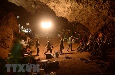 Thai PM visits cave where search for 13 trapped continues