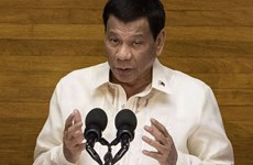 Philippine President signs Muslim autonomy law 