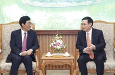 Deputy PM Vuong Dinh Hue welcomes Party chief of Chinese province