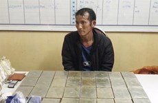 Son La police arrest man smuggling 30 bricks of heroin
