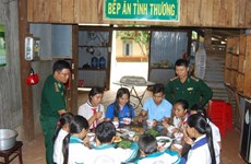 Border guard soldiers help teach students 