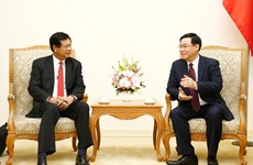 Vietnam shares experience in developing cooperatives with Laos 
