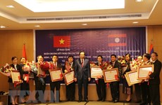 Vietnam, Laos discuss boosting labour, social welfare cooperation 