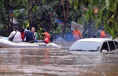 At least 10 dead in Indonesia flooding 