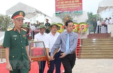 Quang Binh lays martyrs in Laos to rest 