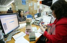 Vietnam, Laos foster cooperation in deposit insurance
