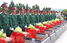 Memorial, reburial services held for fallen soldiers