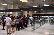 Singapore to stop accepting Malaysian “group passport”