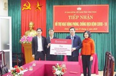 COVID-19: Agribank hands over 800 mln VND to Vinh Phuc 