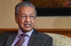 Malaysia’s interim PM proposes forming unity government
