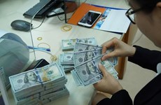 Reference exchange rate up 8 VND on March 11