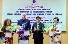 Three foreign experts honoured for supporting health sector in Vietnam
