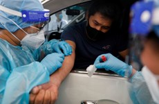 Philippines loosens overseas travel ban on medical workers
