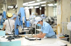 Vietnam textile industry combats pandemic with PPE switch: Forbes