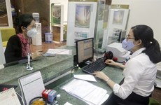 Credit institutions asked to tighten loans in “overheating” sectors: SBV