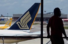 Singapore Airlines reports record annual net loss