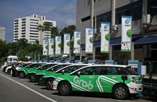 Grab to give commuters choice of electric or hybrid vehicles