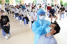 Vietnam reports additional 11,527 COVID-19 cases 