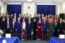 President Nguyen Xuan Phuc meets embassy's staff in Russia