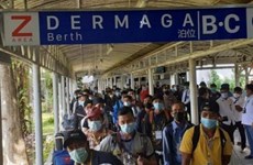 Indonesia, Malaysia work on protection of migrant workers