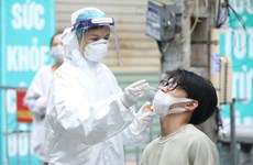 Vietnam reports 15,377 COVID-19 infections on December 13