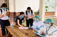 Laos’s daily COVID-19 cases exceed 1,000 