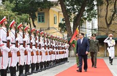 PM visits people’s public security forces prior to Tet holiday