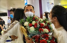 Another 259 Vietnamese from Ukraine arrive home on flight from Poland