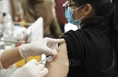 Laos starts giving fourth COVID-19 vaccine doses to adults