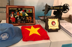 Peacekeeping officers present souvenirs to Vietnam Women's Museum