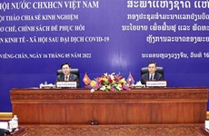 Vietnamese, Lao NAs share experience in designing post-pandemic recovery policies