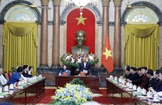 President meets ethnic minority delegation from Tuyen Quang