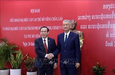 HCM City, Lao capital step up cooperation