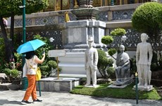 Thailand: Century-old stone sculptures displayed at Emerald Buddha Temple