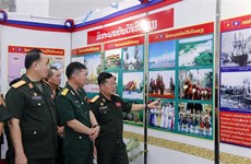 Lao army exhibition marks Friendship and Solidarity Year with Vietnam