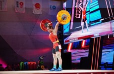 Lifter Thanh dominates Asian weightlifting championships