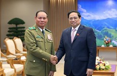 PM receives Lao Deputy PM and Minister of Public Security