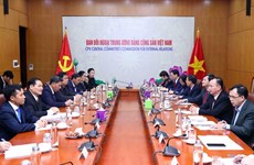Vietnam, Laos share mass mobilisation experience