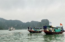 Floating styrofoam buoys in Ha Long Bay collected