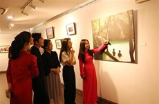 Photo exhibition tells stories about life along Mekong River’s banks