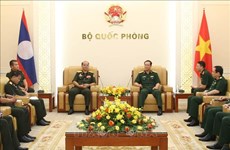 Vietnam, Laos boost collaboration in military logistics