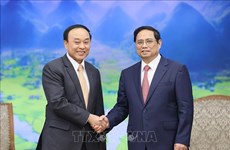 PM pledges Vietnam’s support to Laos in health care