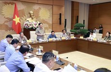 Top legislator chairs working session on draft revised land law