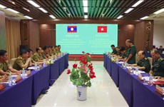 Vietnamese, Lao provinces foster ties in border management