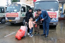 Free of charge coaches take workers home for Tet
