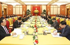 Top leaders of Vietnamese, Lao Parties meet in Hanoi